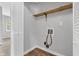This unfinished laundry room has storage and utility hookups at 6853 Kellum Dr, Indianapolis, IN 46221