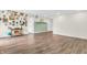 Cozy living room with wood flooring, white walls, and unique decor for a personalized touch at 6853 Kellum Dr, Indianapolis, IN 46221