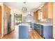 Modern kitchen featuring stainless steel appliances, stylish backsplash and spacious island at 7082 Hunters Ridge Dr, Plainfield, IN 46168