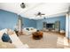 Bright living room with contemporary furnishings and decor and wood floors at 7082 Hunters Ridge Dr, Plainfield, IN 46168