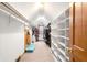 A large walk-in closet with lots of shelving and hanging storage at 7082 Hunters Ridge Dr, Plainfield, IN 46168