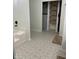 Bathroom featuring patterned tile floors, and a bathtub at 7195 W 700 N, Fairland, IN 46126