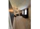 This carpeted bedroom features a ceiling fan, neutral walls, and multiple dressers at 7195 W 700 N, Fairland, IN 46126