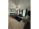 Bedroom with a bed, ceiling fan, area rug, and dresser at 7195 W 700 N, Fairland, IN 46126