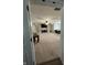 Large bonus room with carpet, ceiling fan, built-in shelving, and desk area at 7195 W 700 N, Fairland, IN 46126