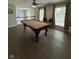 Spacious game room with a pool table, ceiling fan, and hardwood floors at 7195 W 700 N, Fairland, IN 46126
