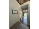 Inviting hallway with stylish decor and access to the bathroom and living area at 7195 W 700 N, Fairland, IN 46126