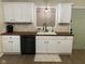 Well-lit kitchen featuring white cabinets, wooden countertops, stainless steel appliances, and modern fixtures at 7195 W 700 N, Fairland, IN 46126
