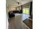 Cozy living room featuring hardwood floors, a sliding glass door, and ample seating at 7195 W 700 N, Fairland, IN 46126