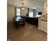 Open concept living room with dining area and view to the backyard at 7195 W 700 N, Fairland, IN 46126