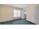 Bedroom with window and view into the bathroom at 753 Walnut St, Franklin, IN 46131