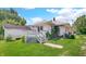 Charming exterior view of a home with a quaint deck and well-maintained lawn at 753 Walnut St, Franklin, IN 46131