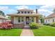 Charming bungalow-style home with brick accents, landscaped yard, and a cozy front porch at 753 Walnut St, Franklin, IN 46131