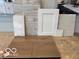 Display of flooring, countertop, and cabinet door samples at 7601 Bluegill Dr, Noblesville, IN 46062