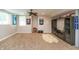 Spacious finished basement area with neutral walls, carpet and fan at 7818 Fawnwood Dr, Indianapolis, IN 46278