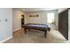 Finished basement featuring a rec room with carpet and billiards table at 7818 Fawnwood Dr, Indianapolis, IN 46278