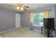 Bedroom with neutral walls, carpet flooring, natural lighting and ceiling fan at 7818 Fawnwood Dr, Indianapolis, IN 46278