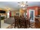 Open floor plan with dining room, living room, and kitchen at 7818 Fawnwood Dr, Indianapolis, IN 46278