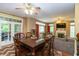 Dining room with a view of the living room and backyard at 7818 Fawnwood Dr, Indianapolis, IN 46278