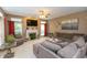 Cozy living room with fireplace and lots of natural light at 7818 Fawnwood Dr, Indianapolis, IN 46278