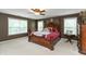 Comfortable main bedroom with sitting area and lots of natural light at 7818 Fawnwood Dr, Indianapolis, IN 46278