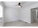 This is a bedroom with new paint and new carpet at 909 N Parker Ave, Indianapolis, IN 46201