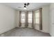 Bedroom features a ceiling fan and bay window for plenty of natural light at 909 N Parker Ave, Indianapolis, IN 46201