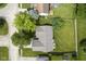 Bird's eye view showcases a property with a well-maintained lawn and mature tree coverage at 11418 Geist Valley Dr, Indianapolis, IN 46236