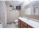 Well-lit bathroom with shower/bath combo, single sink vanity, and neutral color palette at 11418 Geist Valley Dr, Indianapolis, IN 46236
