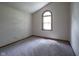 Cozy bedroom with vaulted ceiling and large window at 11418 Geist Valley Dr, Indianapolis, IN 46236