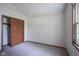 Neutral bedroom with window and closet at 11418 Geist Valley Dr, Indianapolis, IN 46236