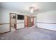 Spacious bedroom features an ensuite bathroom, walk-in closet, and a cozy ceiling fan at 11418 Geist Valley Dr, Indianapolis, IN 46236