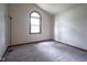 Bedroom with vaulted ceilings and window at 11418 Geist Valley Dr, Indianapolis, IN 46236