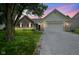 Charming single-Gathering home featuring a two-car garage, brick accents, and well-maintained landscaping at 11418 Geist Valley Dr, Indianapolis, IN 46236
