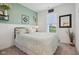 Charming bedroom with soothing colors, a plush bed, and natural light from the window at 11429 Lottie Cir, Noblesville, IN 46060