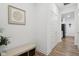 Inviting hallway with a bench, stylish decor, and easy access to other rooms at 11429 Lottie Cir, Noblesville, IN 46060