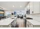 Stylish open floorplan with kitchen island, dining area and living room creating an inviting living space at 11429 Lottie Cir, Noblesville, IN 46060