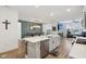 Modern open floorplan showcasing kitchen island, dining area and living room for easy entertaining at 11429 Lottie Cir, Noblesville, IN 46060
