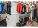 Spacious walk-in closet with a variety of shelving, hanging racks and clothes at 11429 Lottie Cir, Noblesville, IN 46060