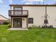 A beautiful outdoor backyard view with a second story deck at 1205 Cypress Dr, Shelbyville, IN 46176