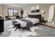 Elegantly decorated bedroom with stylish furnishings and a plush bed at 1205 Cypress Dr, Shelbyville, IN 46176