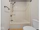 Clean shower with updated fixture and bright lighting at 1205 Cypress Dr, Shelbyville, IN 46176