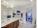 Bright, ensuite bathroom features double sinks, a vanity, and a stand-up shower at 1255 Crabapple Rd, Franklin, IN 46131