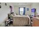 Bedroom featuring a bed, window with curtains, and ceiling fan at 1255 Crabapple Rd, Franklin, IN 46131