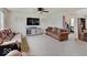 Spacious living room featuring neutral carpet and lots of seating at 1255 Crabapple Rd, Franklin, IN 46131