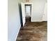 Cozy bedroom featuring hardwood floors, ample natural light and modern finishes at 128 E 36Th St, Anderson, IN 46013