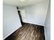 Cozy bedroom featuring hardwood floors, ample natural light and modern finishes at 128 E 36Th St, Anderson, IN 46013