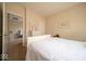 Inviting bedroom with a doorway, neutral walls, carpet, and an elegantly styled dresser at 12976 Walbeck Dr, Fishers, IN 46037