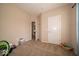Bright bedroom with carpet and an open door to a room with lots of light from the windows at 12976 Walbeck Dr, Fishers, IN 46037