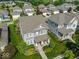 Beautiful two-story home features manicured landscaping and inviting front porch in a desirable neighborhood at 12976 Walbeck Dr, Fishers, IN 46037